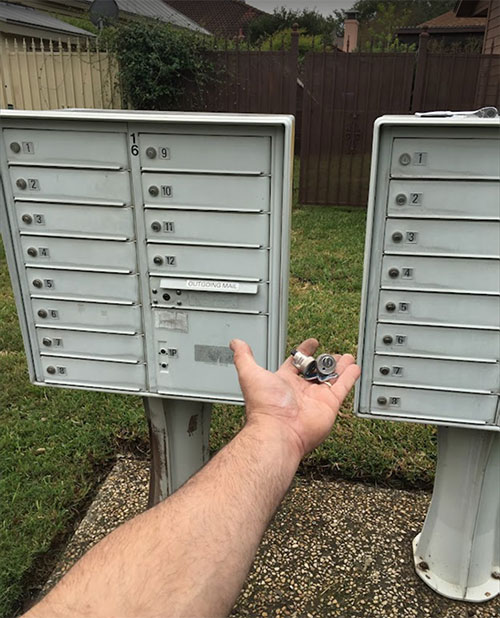 Replaced locks in a USPS cluster box.