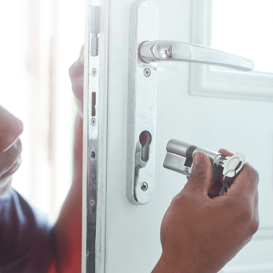 Completing Locksmith Service on Front Door. Homeowner broke key.  San Antonio Residential Locksmith - San Antonio, TX - The Key Man Locksmith